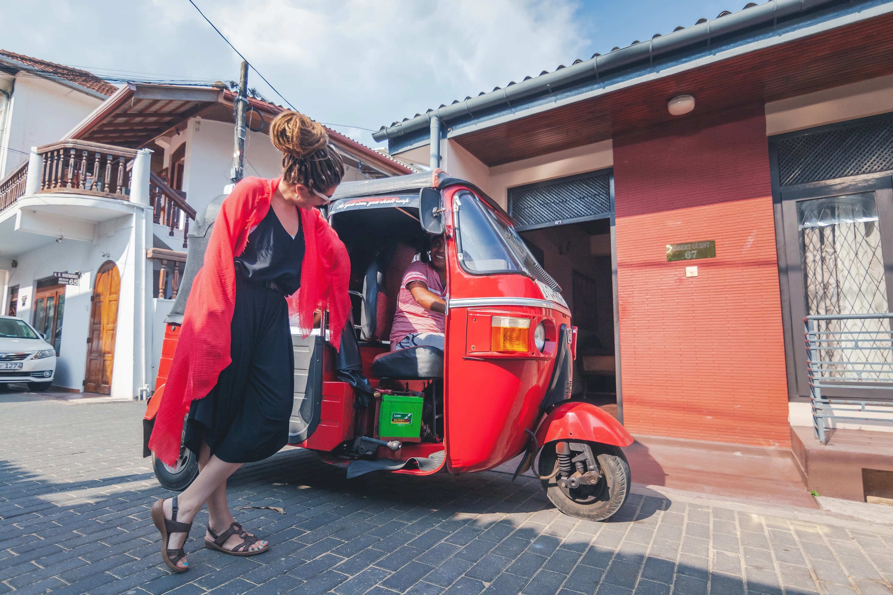 Traveler experiencing Sri Lanka in a tuk tuk